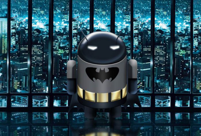 Картинка робот Андроид в костюме Бэтмена на фоне зданий мегаполиса